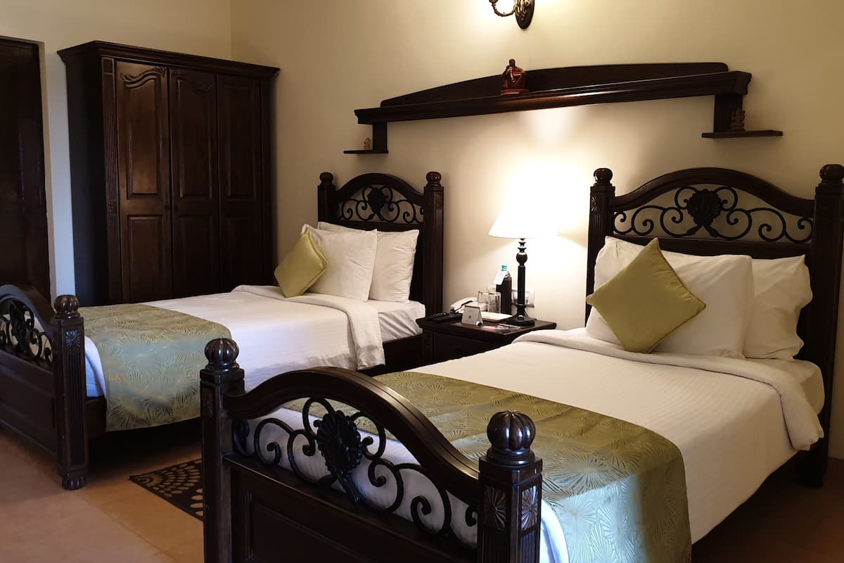 superior twin room, 2 single beds, balcony, garden view | 1 bedroom, egyptian cotton sheets, premium bedding, select comfort beds