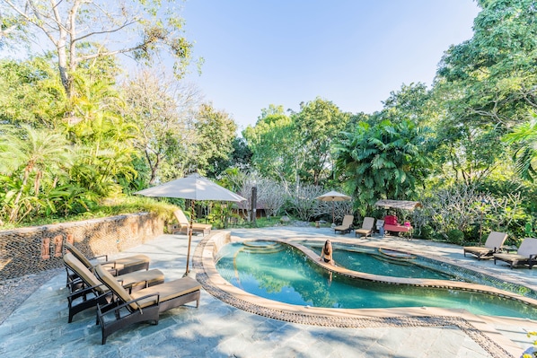 3 outdoor pools, open 7:00 AM to 7:00 PM, pool umbrellas, pool loungers