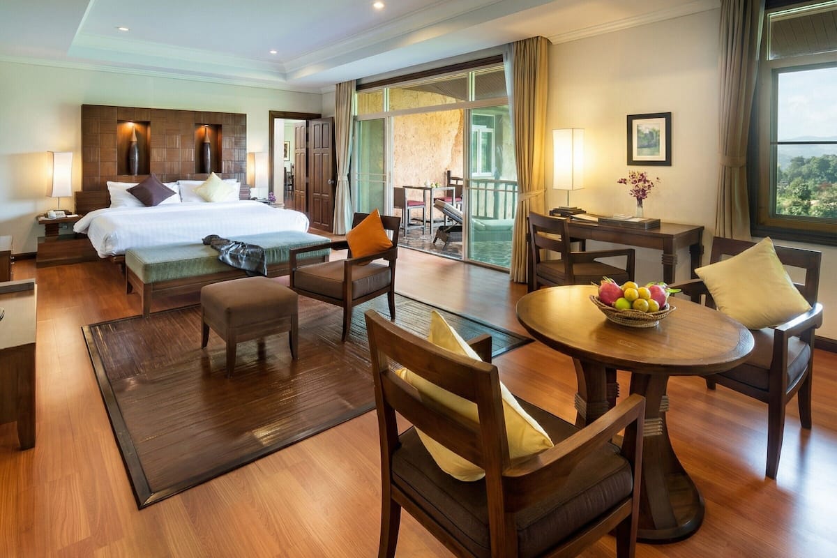 Suite, 2 habitaciones | Ropa de cama de alta calidad, edredón y minibar