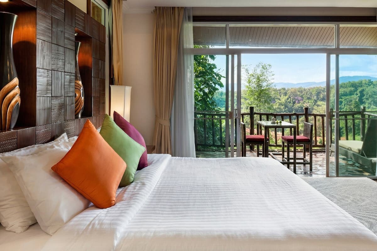 Suite superior | Ropa de cama de alta calidad, edredón y minibar