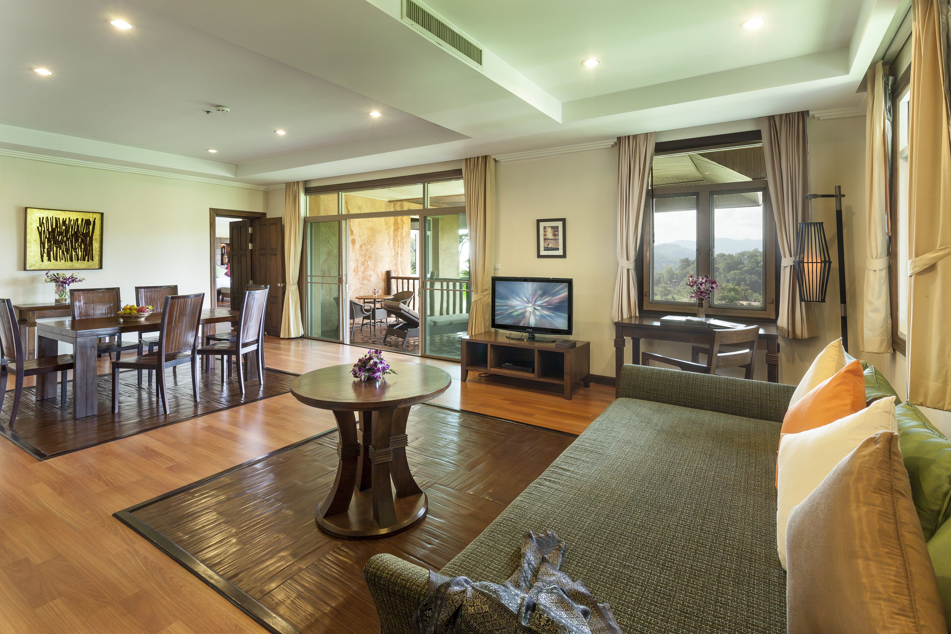 Suite, 2 Bedrooms | Living room | 40-inch LCD TV with satellite channels, TV, DVD player