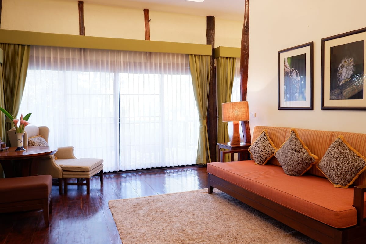 original thai suite | living area | 40-inch lcd tv with satellite channels, tv, dvd player