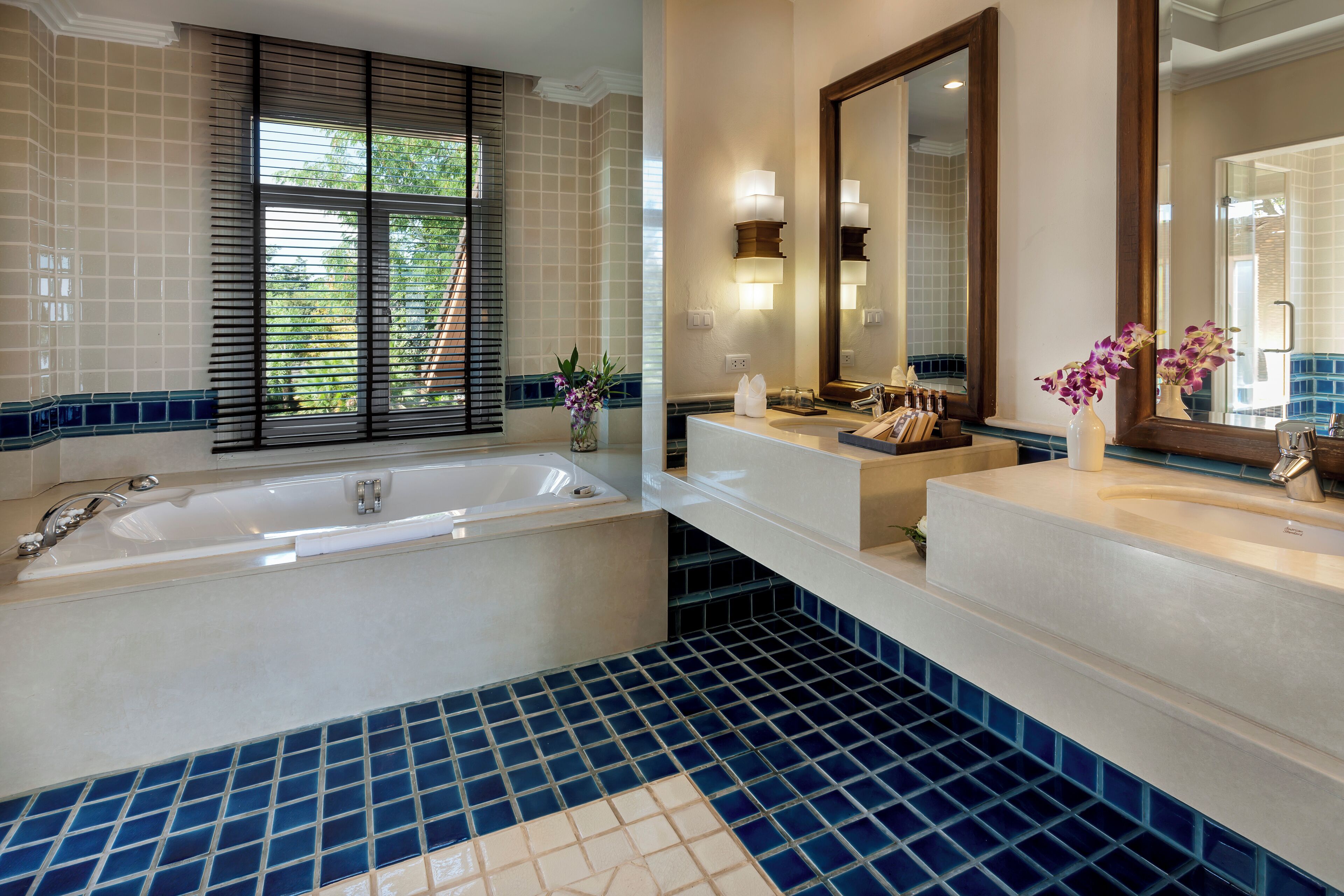honeymoon suite | bathroom | separate bathtub and shower, deep-soaking bathtub, hair dryer, bathrobes