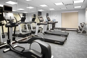 A gym with treadmills, ellipticals, and weight machines. - Fairfield Inn & Suites Milledgeville (Milledgeville)