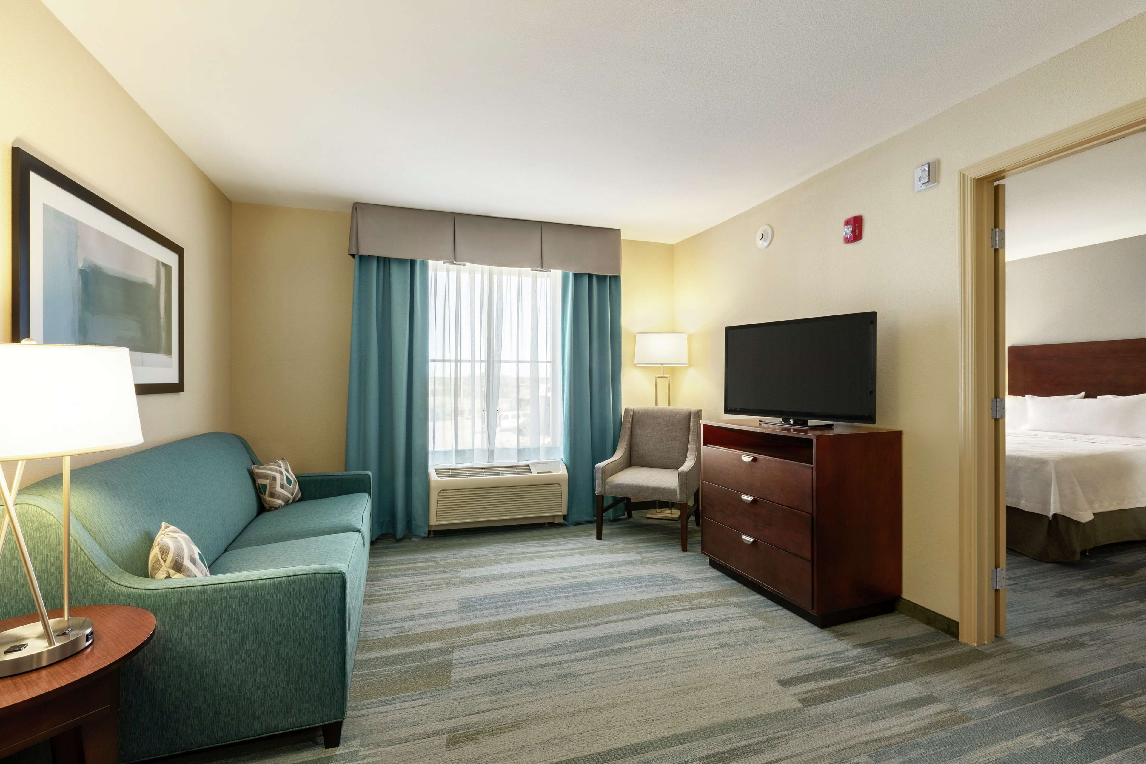 suite, 2 queen beds, accessible, bathtub (mobility & hearing) | in-room safe, desk, laptop workspace, iron/ironing board
