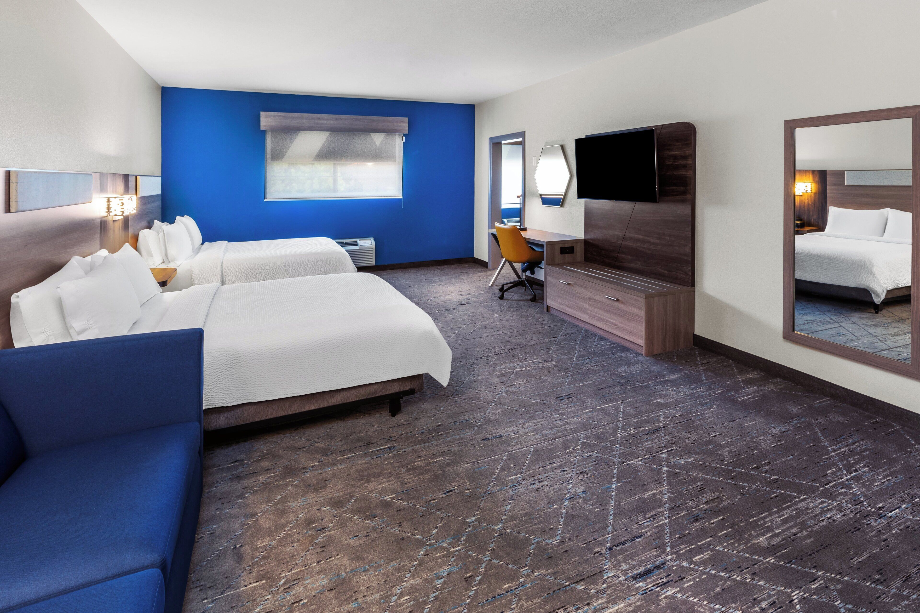 suite, multiple beds | in-room safe, desk, iron/ironing board, free cots/infant beds