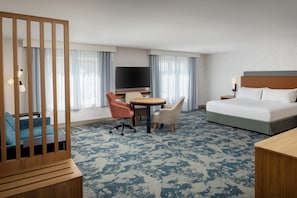 Hypo-allergenic bedding, desk, laptop workspace, blackout curtains