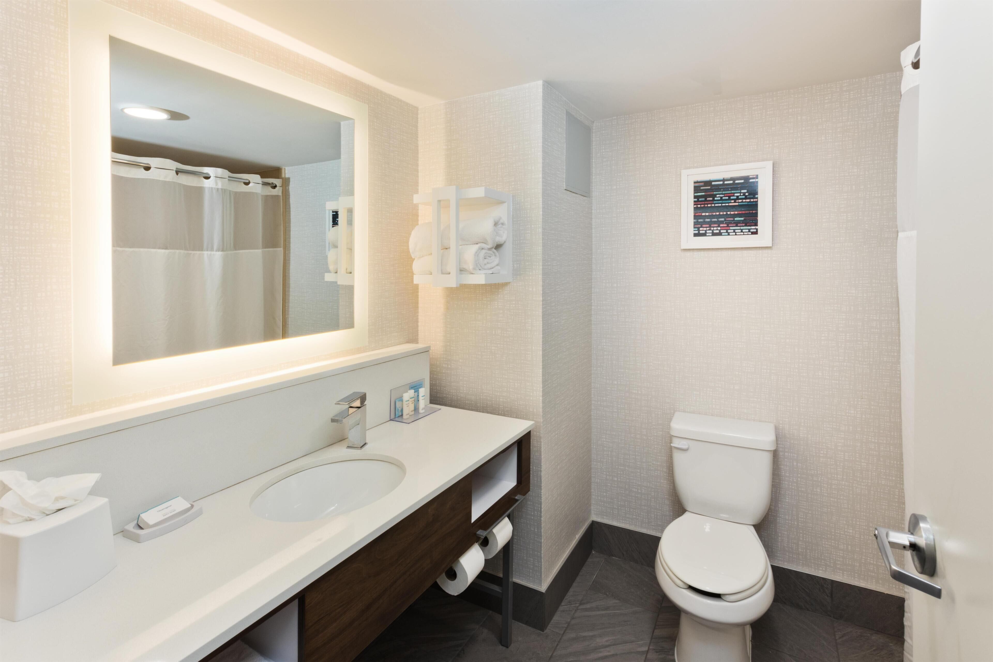 Bathtub, hair dryer, towels