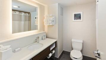 Bathtub, hair dryer, towels