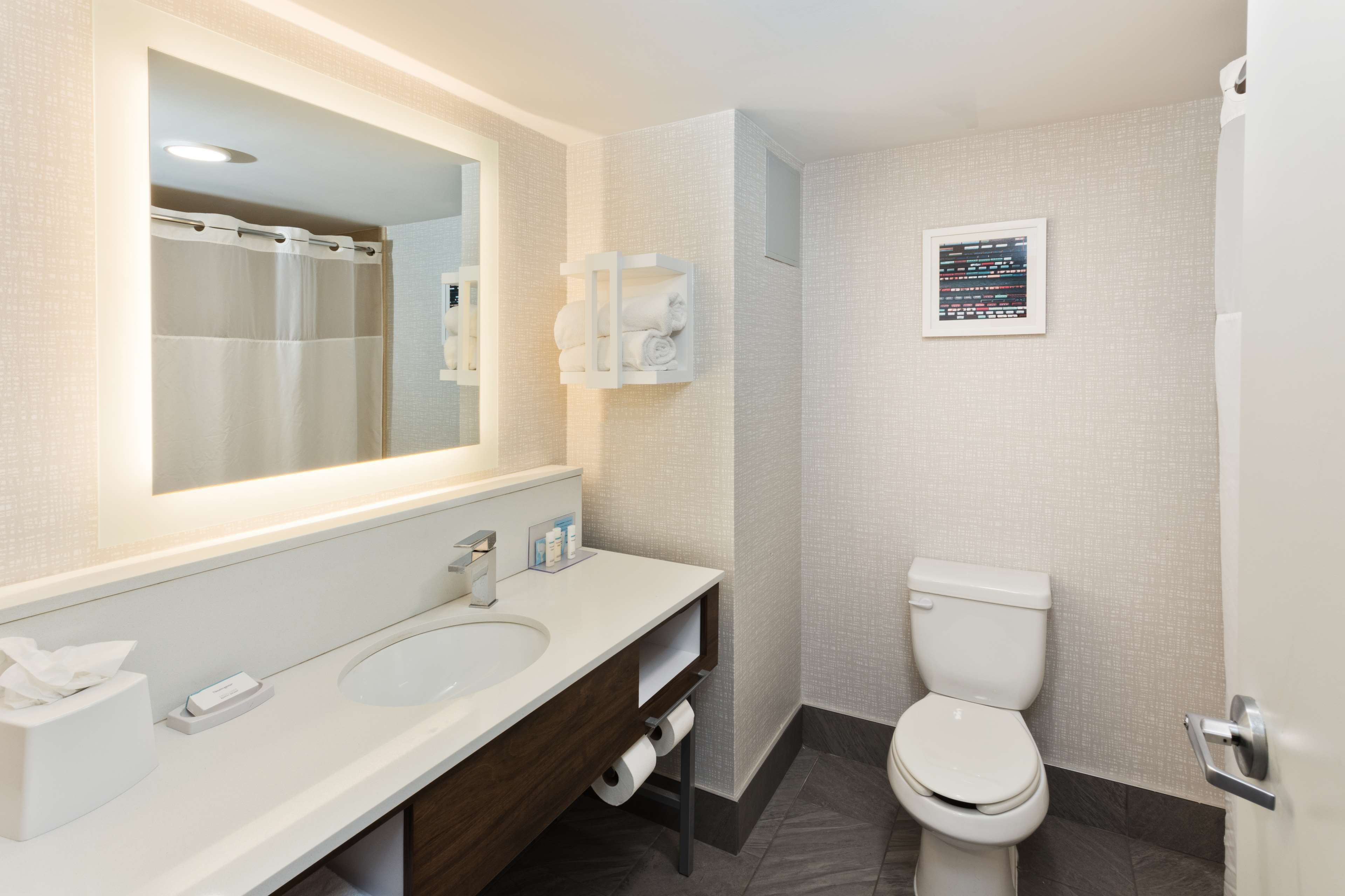 bathtub, hair dryer, towels