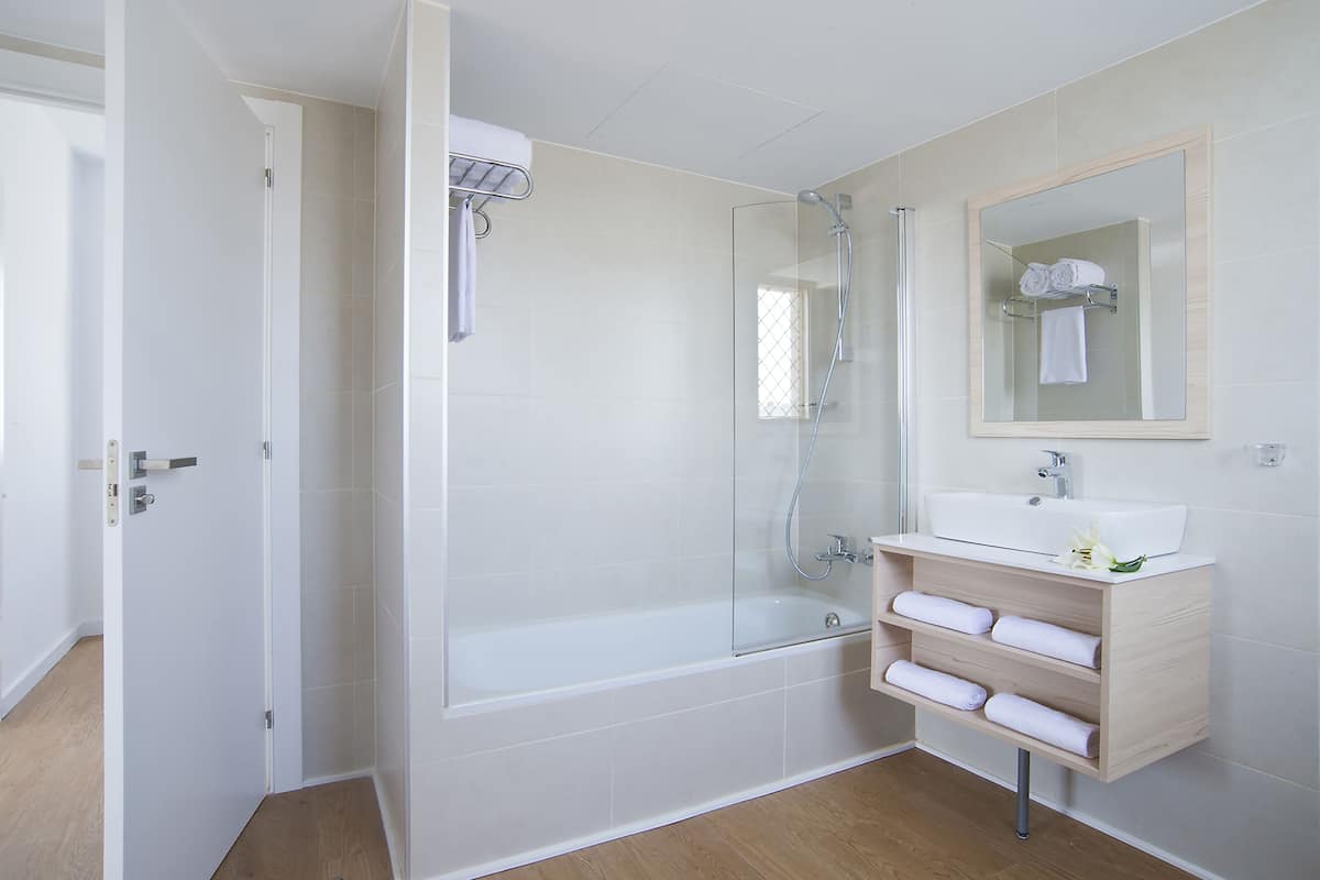 free toiletries, hair dryer, towels, toilet paper