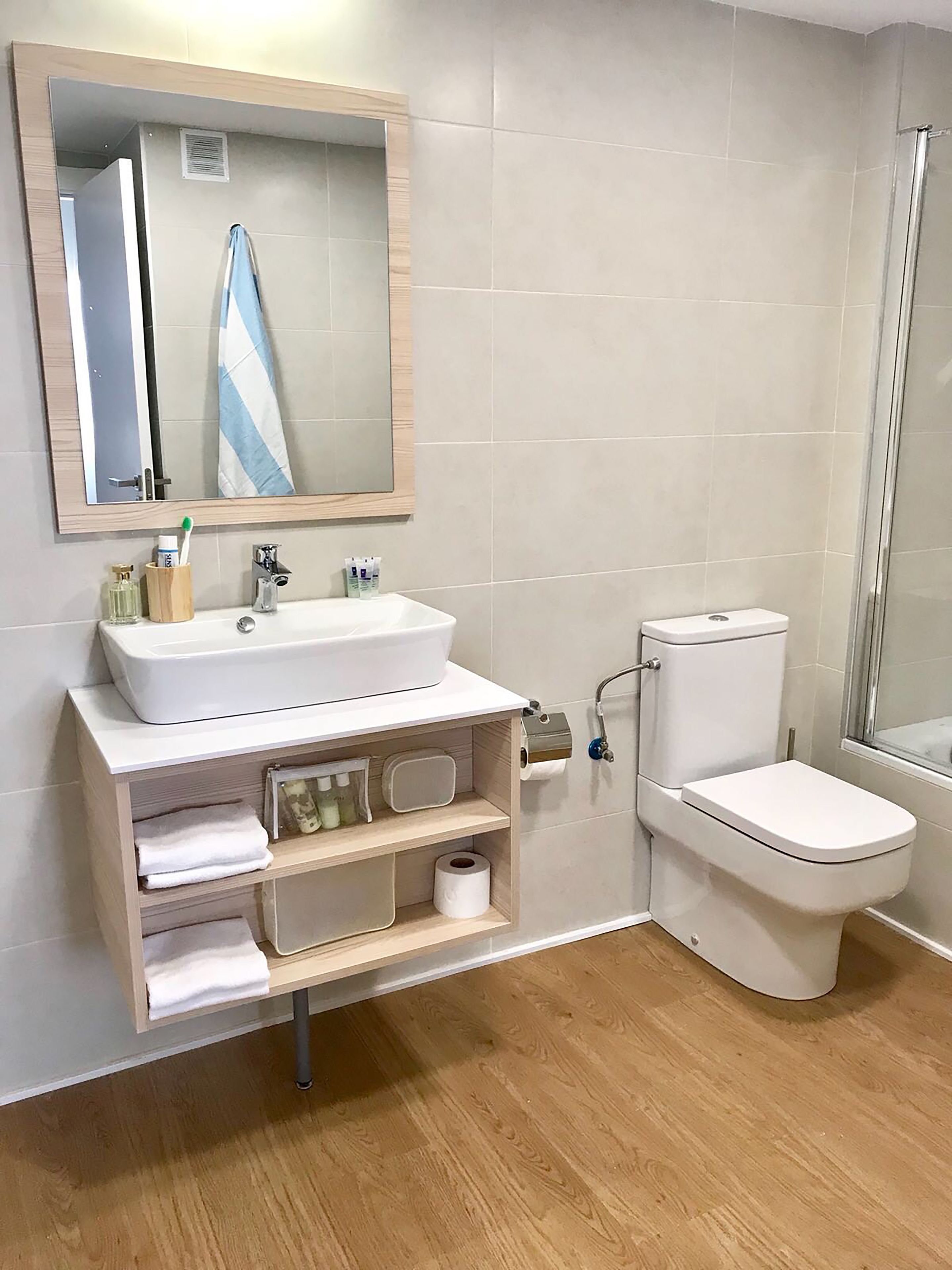 free toiletries, hair dryer, towels, toilet paper