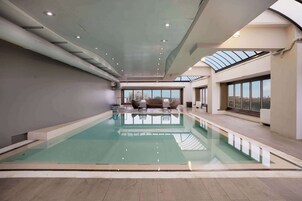 Indoor pool, open 7:00 AM to 9:00 PM, sun loungers