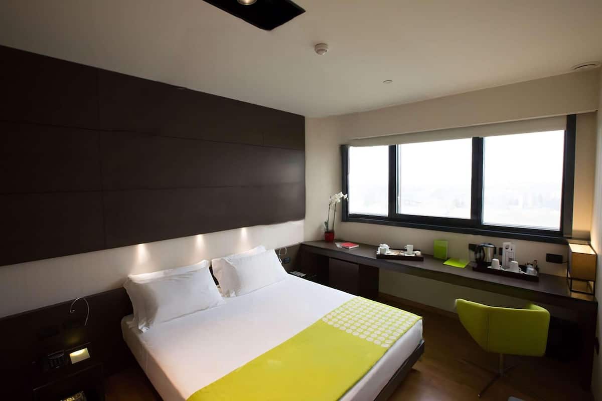 Hypo-allergenic bedding available, down comforters, minibar