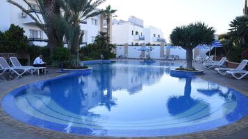 Outdoor pool, pool umbrellas, pool loungers