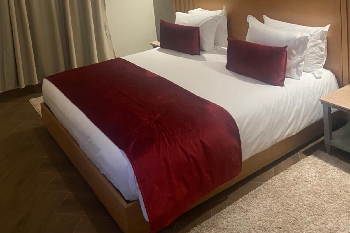 Blackout drapes, soundproofing, iron/ironing board (on request)