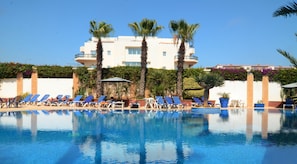 Outdoor pool, pool umbrellas, pool loungers
