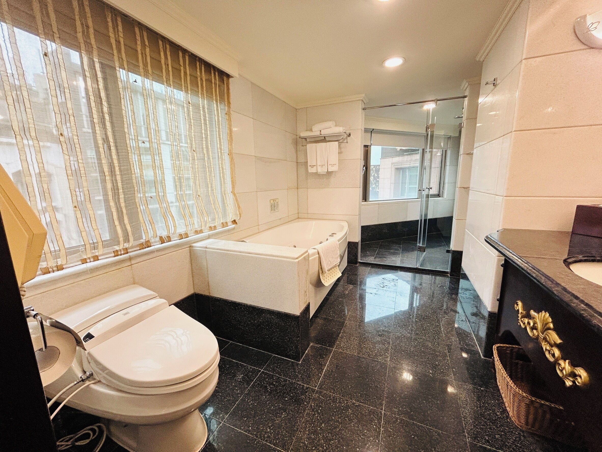 triple room (royal building) | bathroom | eco-friendly toiletries, hair dryer, slippers, towels