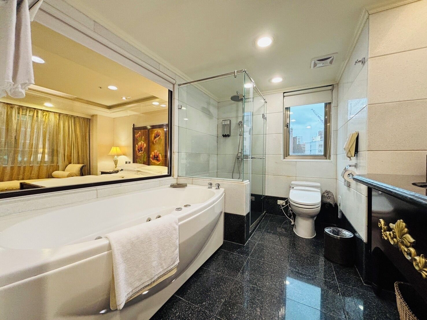 Eco-friendly toiletries, hair dryer, slippers, towels