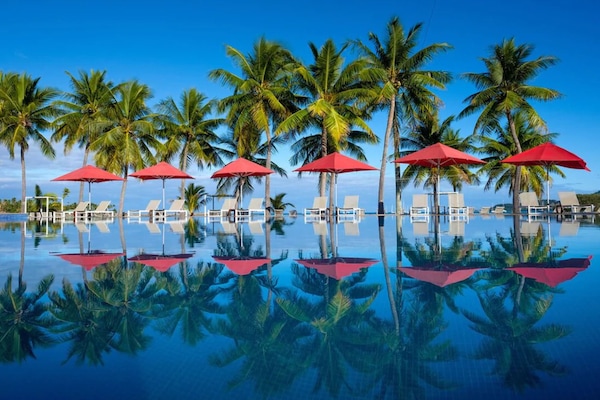 2 outdoor pools, pool umbrellas, sun loungers