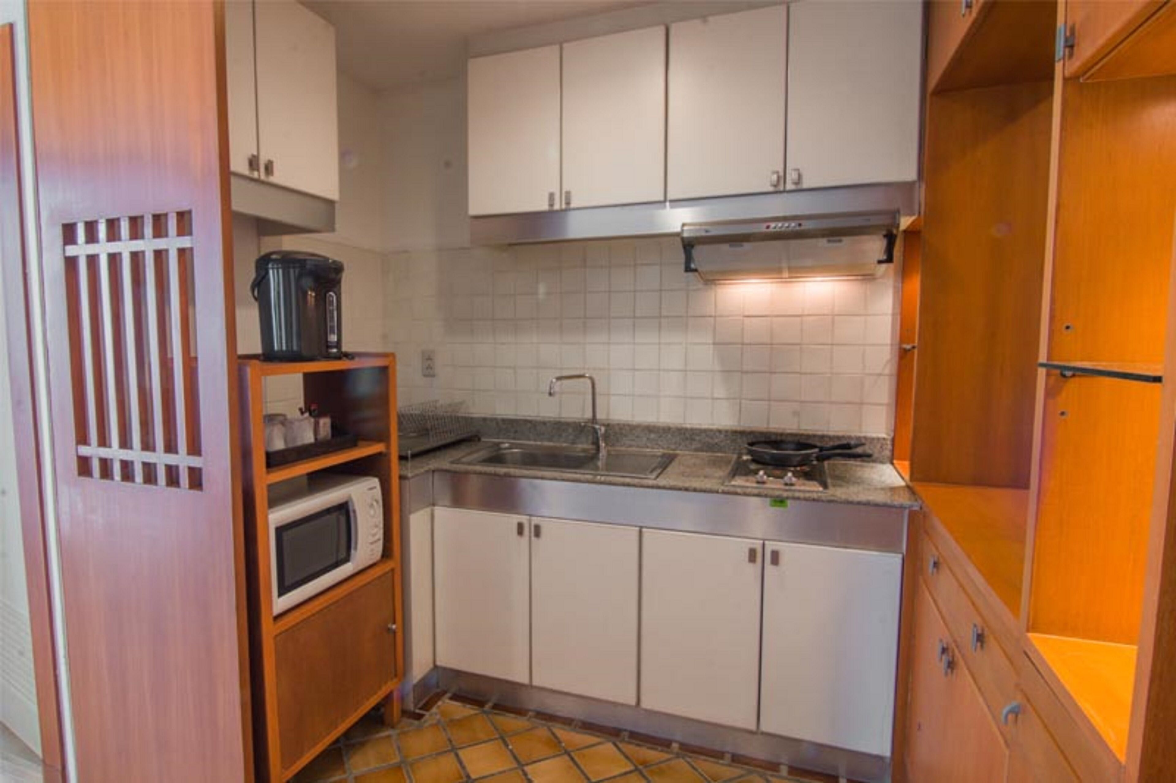 1 bedroom hotel | private kitchenette | full-sized fridge, microwave, coffee/tea maker, electric kettle