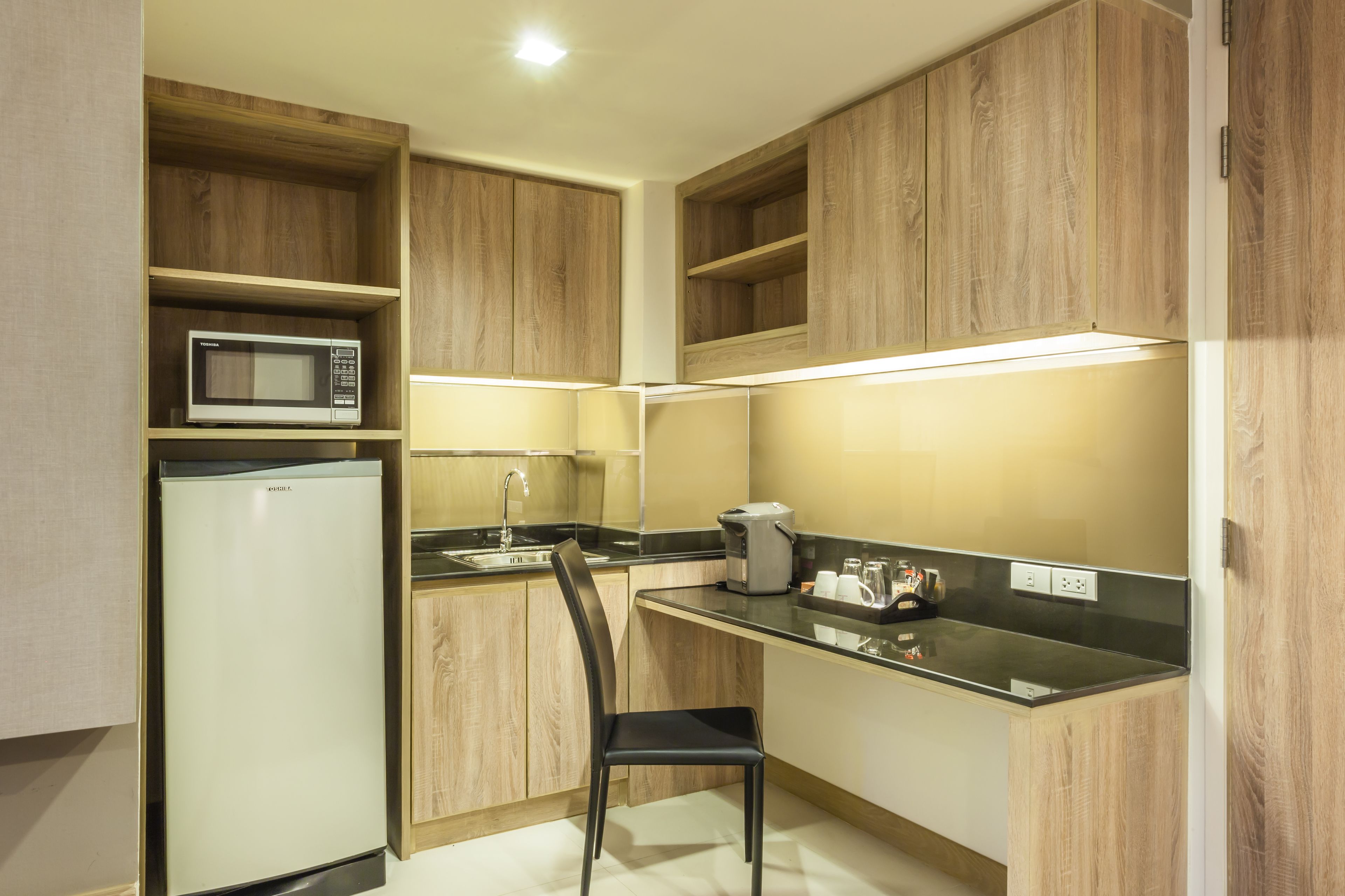 deluxe place | private kitchenette | full-sized fridge, microwave, coffee/tea maker, electric kettle