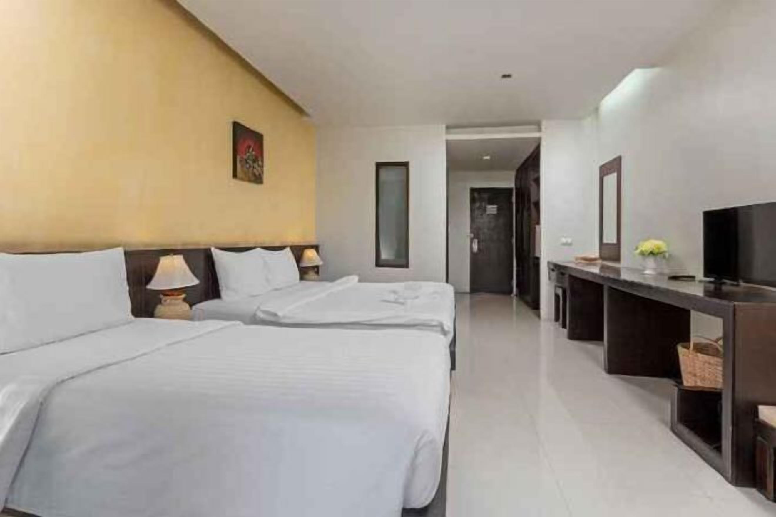 Free minibar items, laptop workspace, blackout drapes, free WiFi