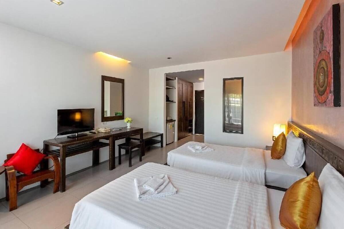 Free minibar items, laptop workspace, blackout drapes, free WiFi