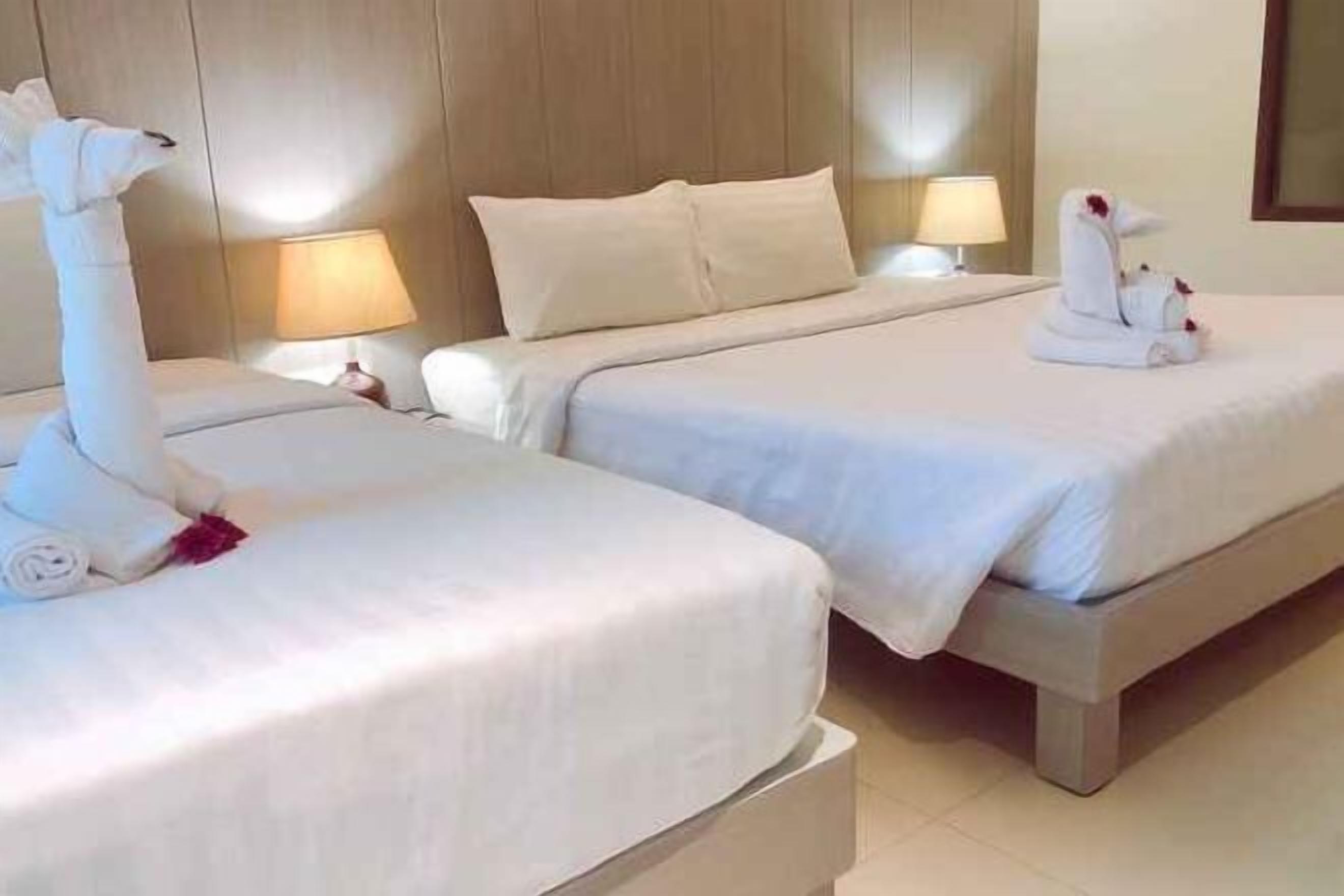 Free minibar items, laptop workspace, blackout drapes, free WiFi