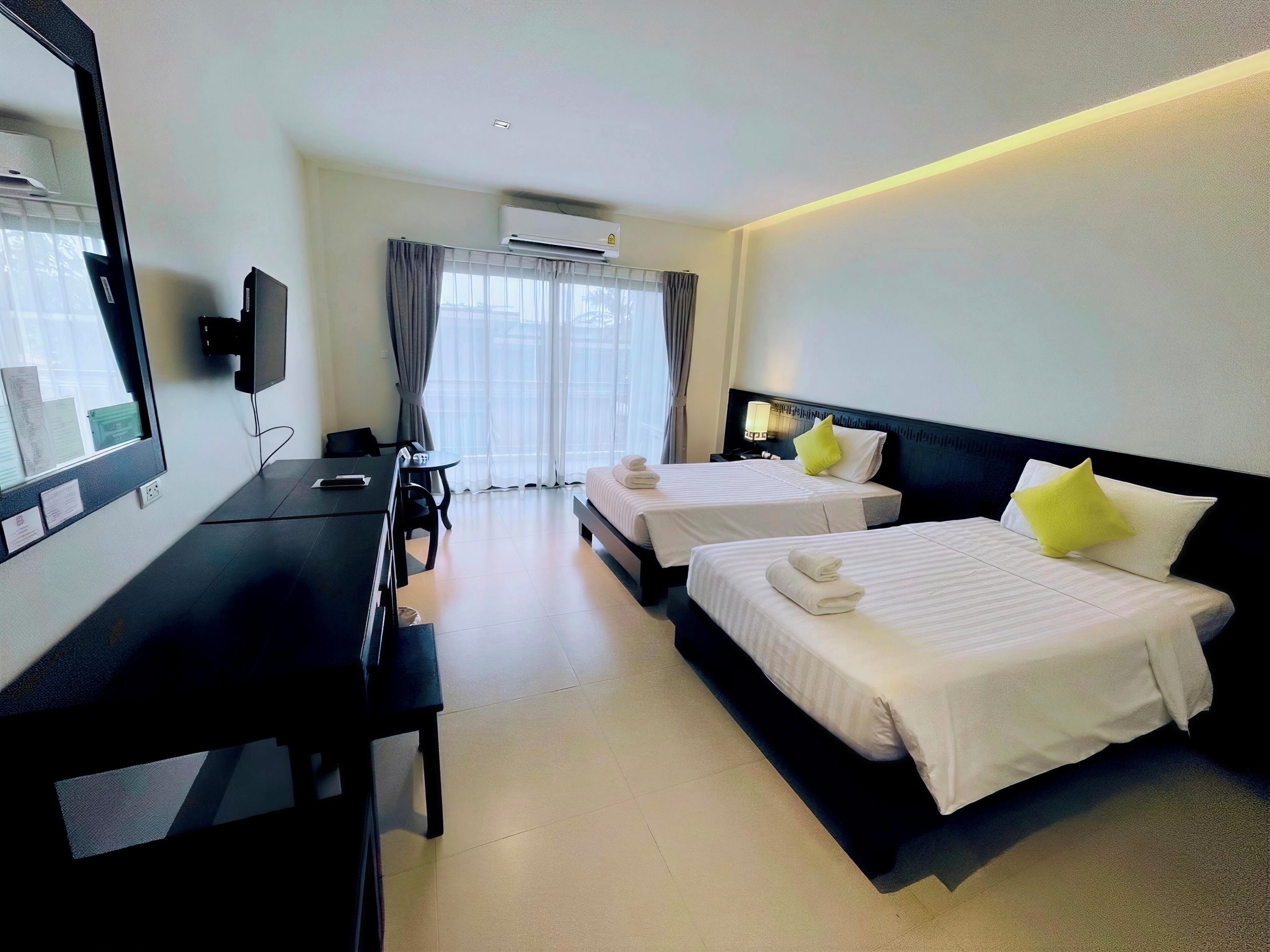 Deluxe Pool View (Twins) | Free minibar items, laptop workspace, blackout drapes, free WiFi