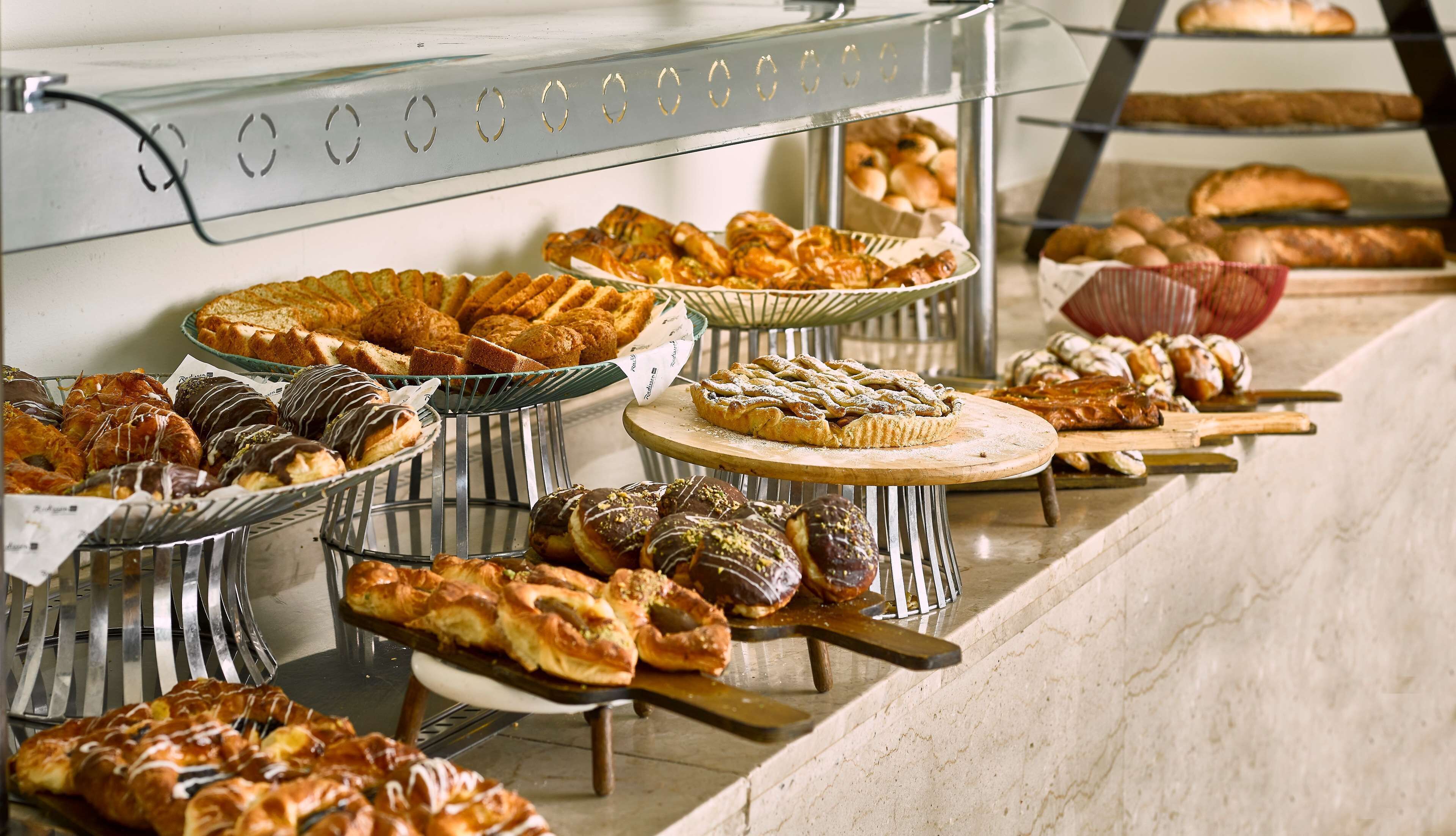 Daily buffet breakfast (USD 12 per person)