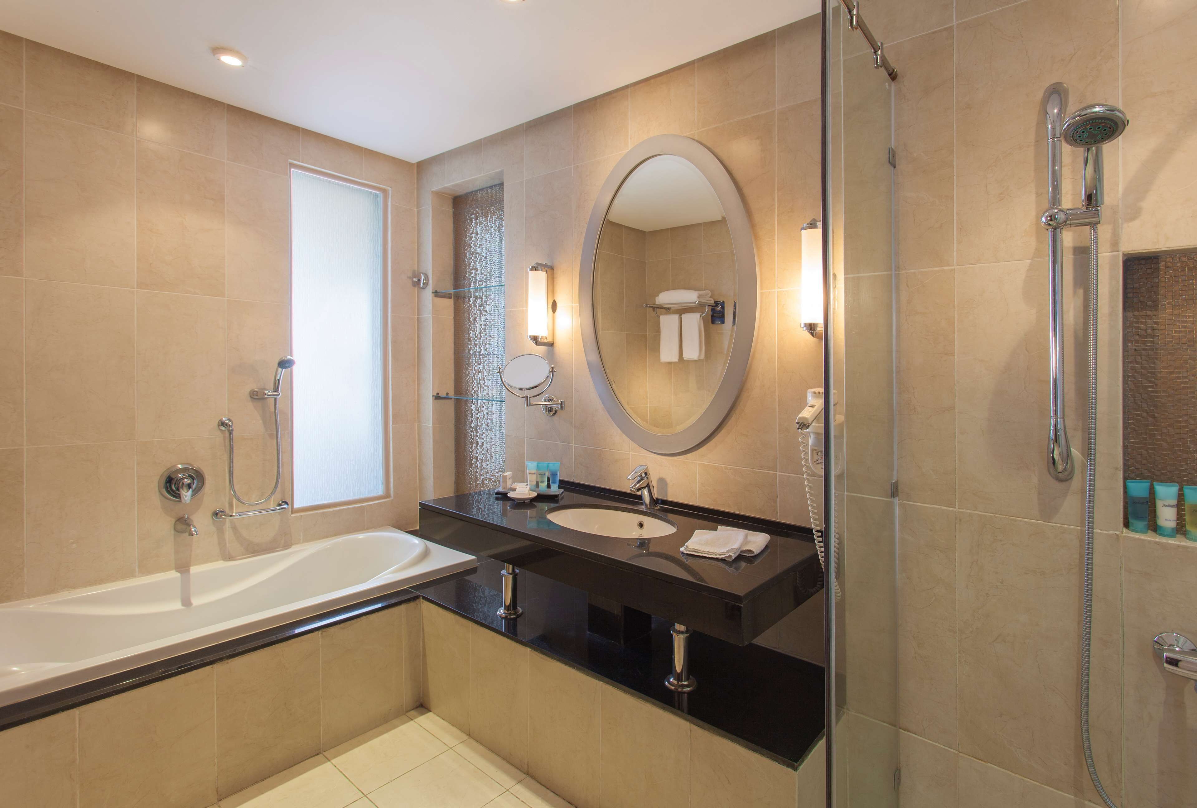 separate bathtub and shower, deep-soaking bathtub, free toiletries