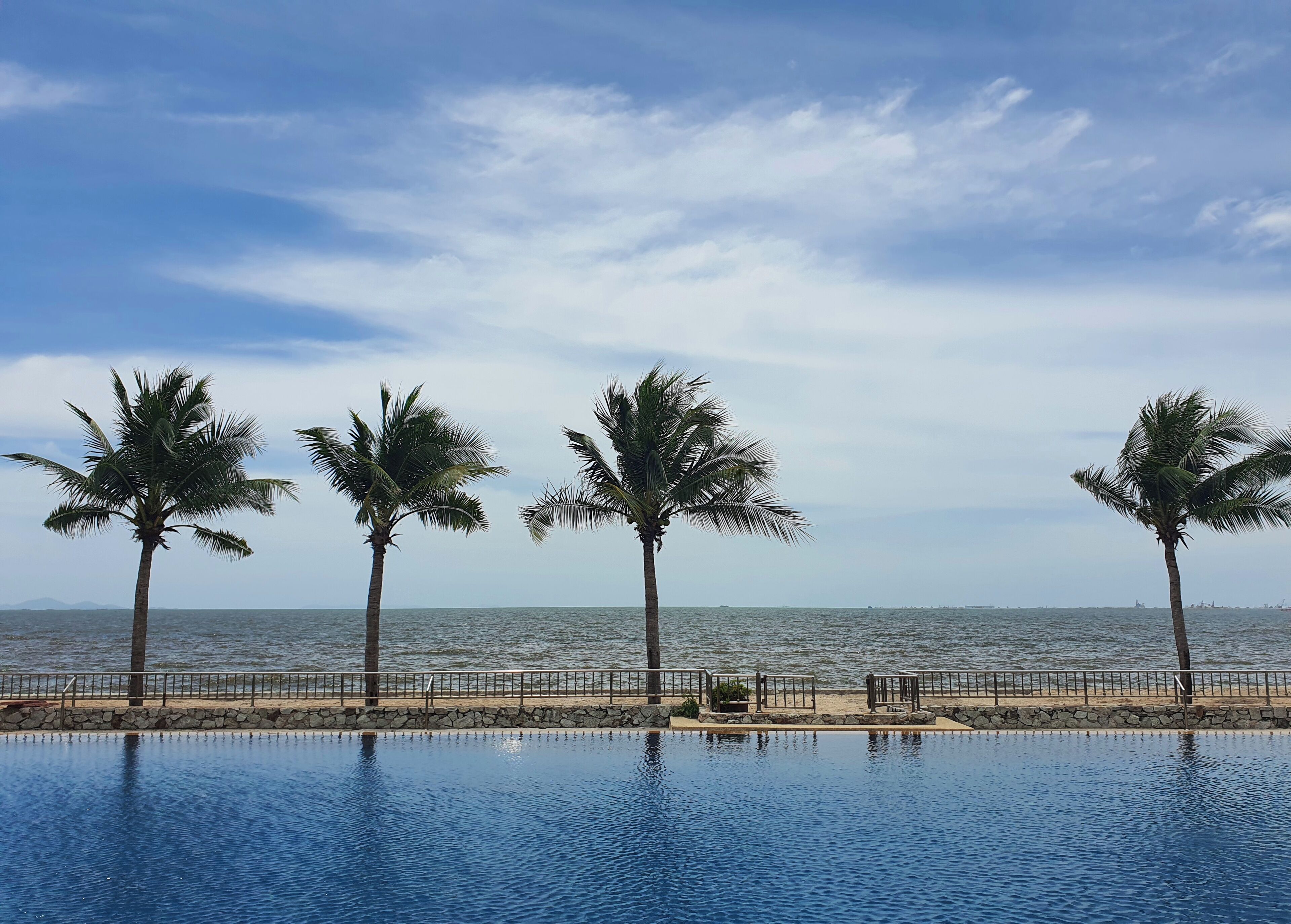 outdoor pool, open 7:00 am to 9:00 pm, pool umbrellas, pool loungers