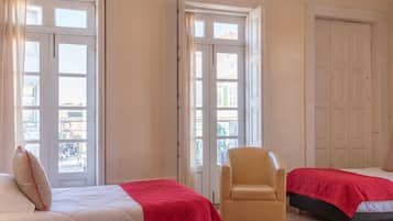 Habitación cuádruple | Cunas gratuitas, wifi gratis y ropa de cama