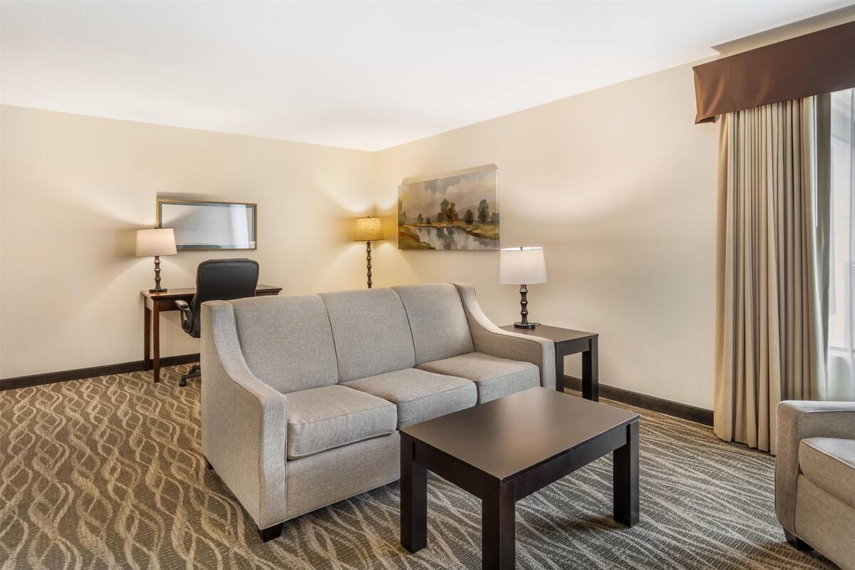 Suite, 2 Queen Beds, Non Smoking, Kitchen | Desk, laptop workspace, iron/ironing board, rollaway beds
