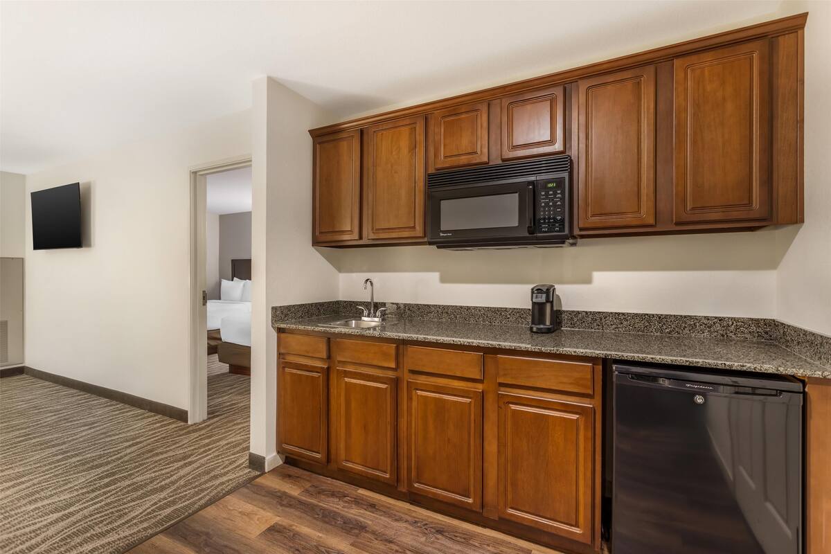 Suite, 2 Queen Beds, Non Smoking, Refrigerator & Microwave | Desk, laptop workspace, iron/ironing board, rollaway beds