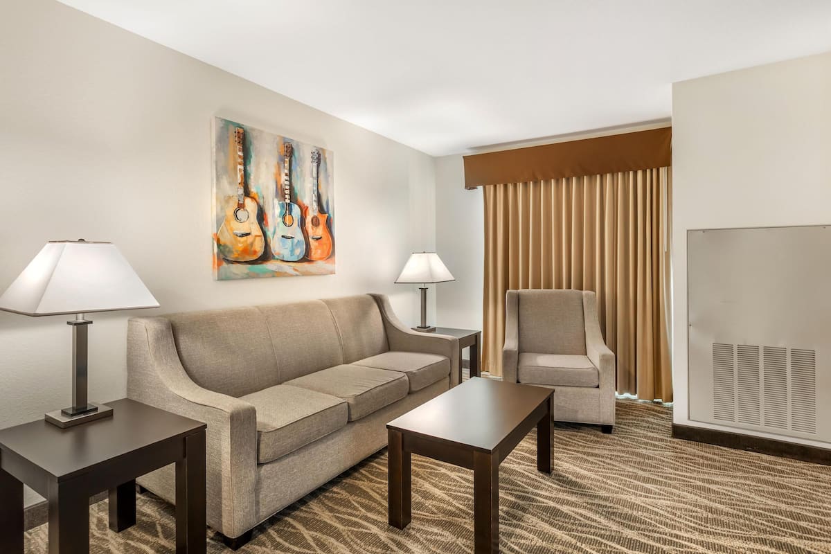 Suite, Multiple Beds, Non Smoking, Kitchen (with Sofabed) | Desk, laptop workspace, iron/ironing board, rollaway beds