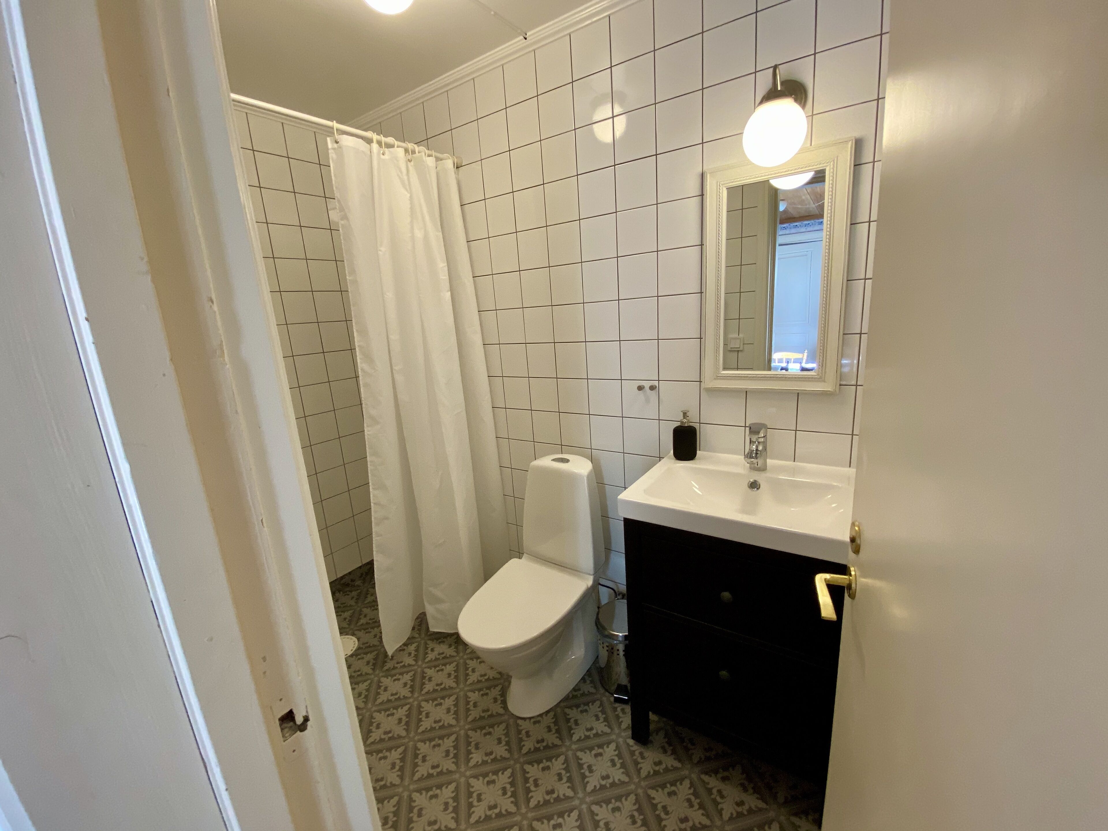 shower, hair dryer, bathrobes, slippers