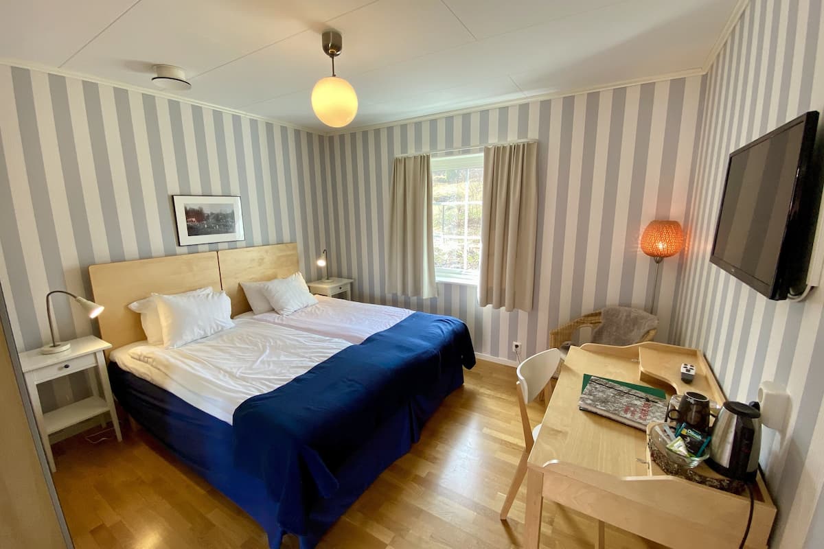 individually furnished, desk, laptop workspace, iron/ironing board