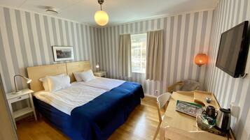 Individually furnished, desk, laptop workspace, iron/ironing board