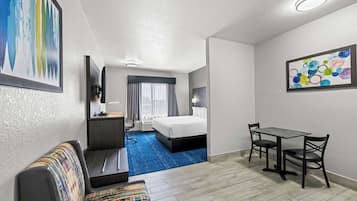Standard Room, 1 King Bed, Non Smoking, Kitchenette | Desk, laptop workspace, blackout curtains, iron/ironing board
