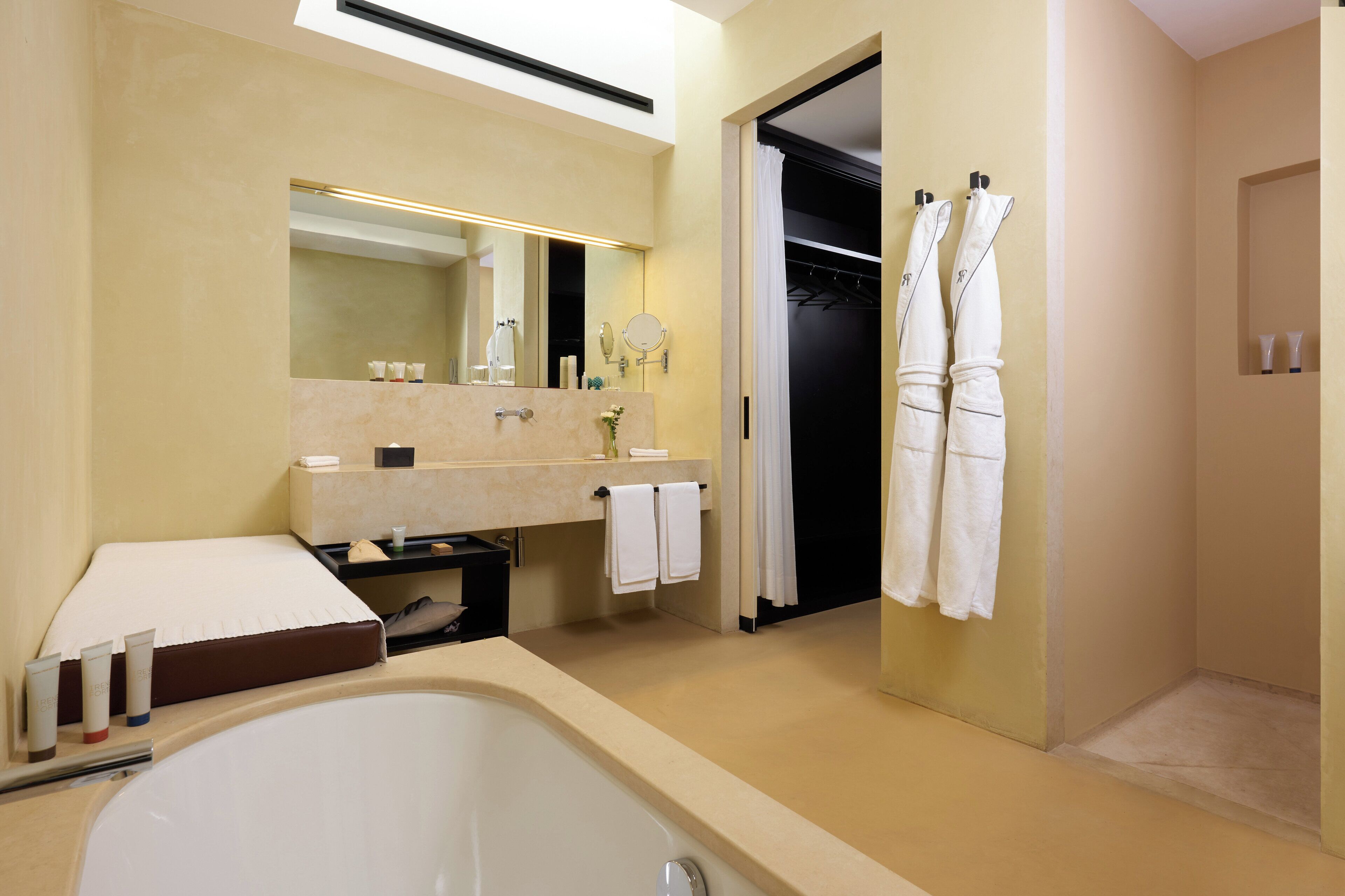 Separate bathtub and shower, rainfall showerhead, free toiletries