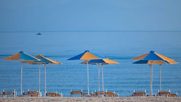 Private beach, sun-loungers, beach umbrellas