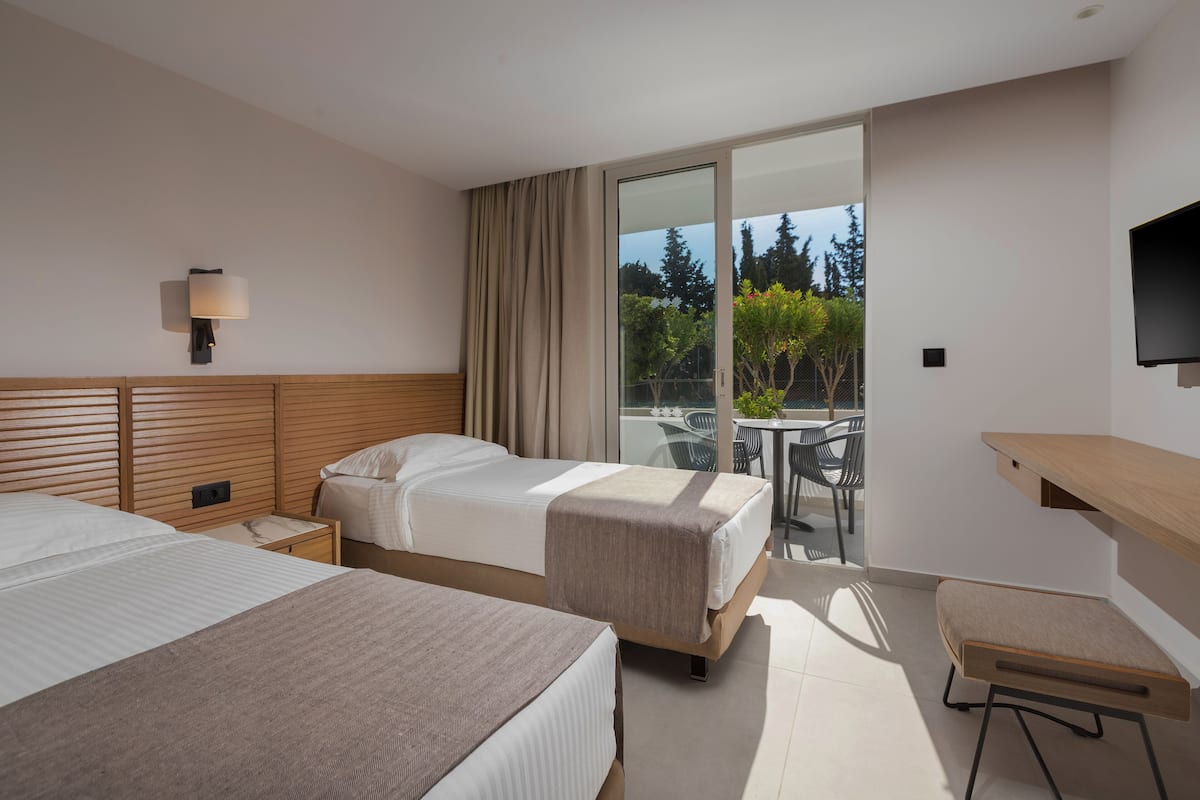 family room | living area | flat-screen tv, ping pong, books