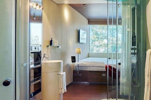 Shower, hydromassage showerhead, eco-friendly toiletries, hair dryer