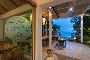 Breakfast, lunch, dinner served; international cuisine, beach views 