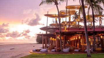 On the beach, sun loungers, beach umbrellas, beach towels