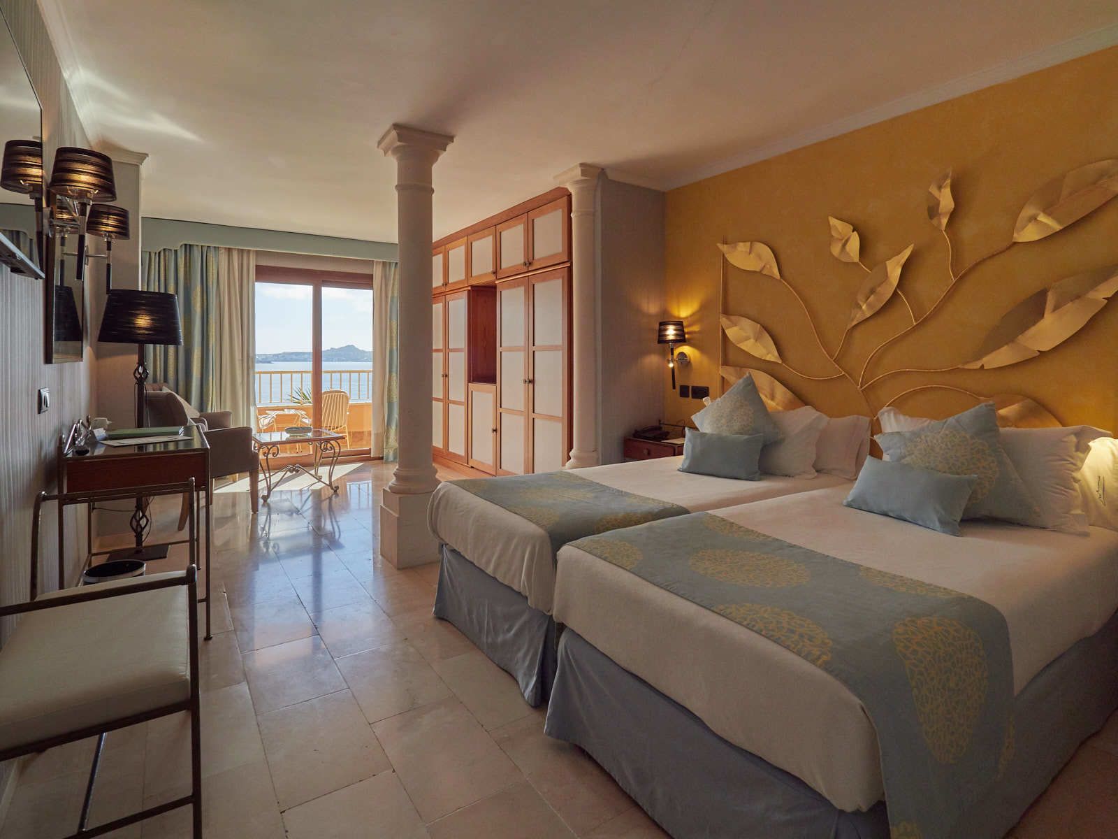 junior suite, sea view | minibar, in-room safe, desk, iron/ironing board