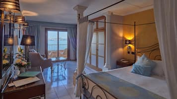 Junior Suite, Sea View | Minibar, in-room safe, desk, iron/ironing board