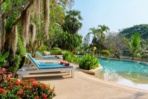 Outdoor pool, open 7:00 AM to 7:00 PM, pool umbrellas